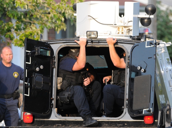 Members of the Columbia Police Department SWAT team arrive in a vehicle called the peacemaker Monday, Sept. 24, 2012 on Bonny Linn Drive. Columbia Police surrounded the house for over eight hours over a tip of a potential shooting suspect inside the house. The house was empty.